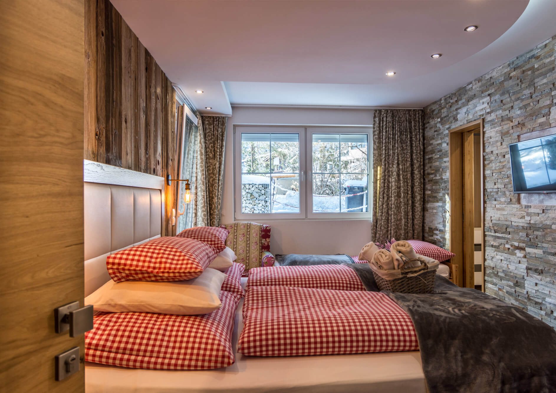 Wohnbereich im Deluxe Zimmer mit Zustellbett